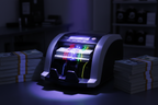 Bill counter using UV light to verify security features on US dollar banknotes